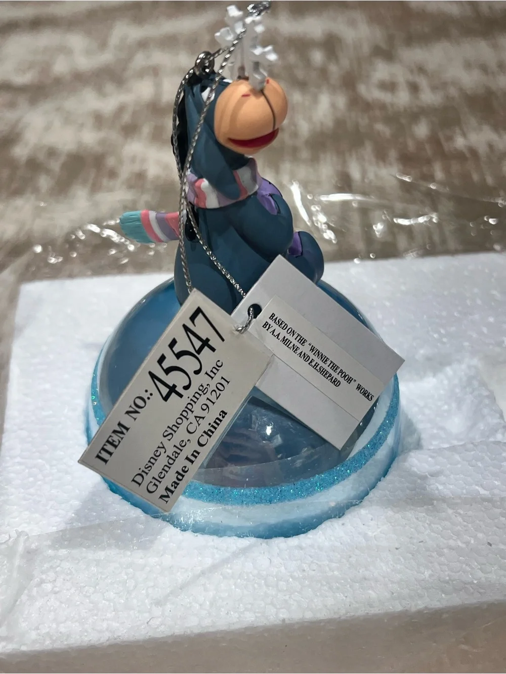 Disney eeyore perched